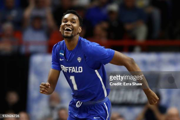 Montell McRae of the Buffalo Bulls celebrates after drawing a charge in the second half against the Arizona Wildcats during the first round of the...