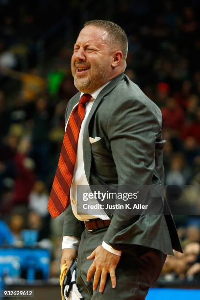 Head coach Buzz Williams of the Virginia Tech Hokies reacts to Justin Robinson foul on Collin Sexton of the Alabama Crimson Tide late in the second...