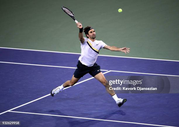 Roger Federer Switzerland volleys against Hyeon Chung of Korea during Day 11 of BNP Paribas Open on March 15, 2018 in Indian Wells, California.