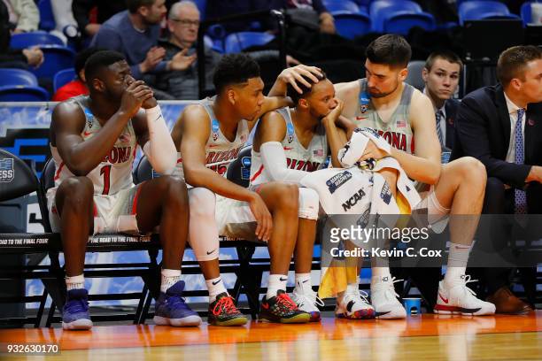 Rawle Alkins, Allonzo Trier, Parker Jackson-Cartwright, and Dusan Ristic of the Arizona Wildcats react on the bench in the second half against the...
