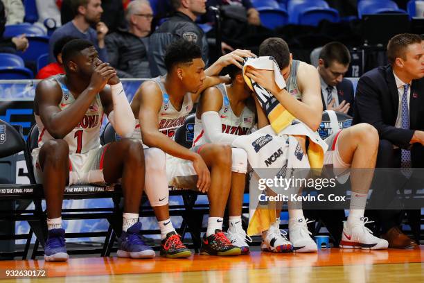 Rawle Alkins, Allonzo Trier, Parker Jackson-Cartwright, and Dusan Ristic of the Arizona Wildcats react on the bench in the second half against the...