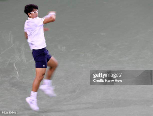 Hyeon Chung of South Korea hits a forehand in his quaterfinal loss to Roger Federer of Switzerland during the BNP Paribas Open at the Indian Wells...