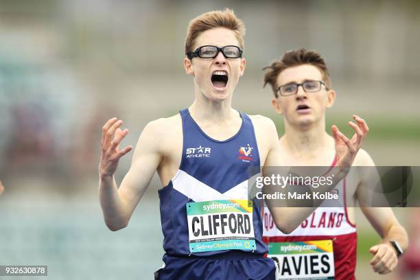 Jaryd Clifford of Victoria celebrates victory in the Men's under 20 1500 Metre final during day three of the Australian Junior Athletics...