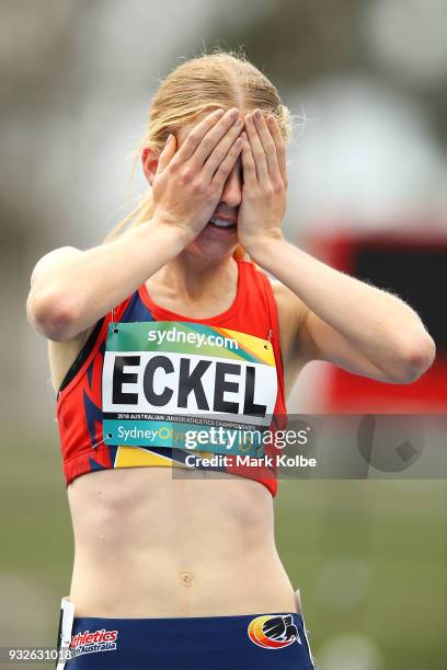 Sarah Eckel of South Australia celebrates victory in the women's under 20 1500 Metre final during day three of the Australian Junior Athletics...