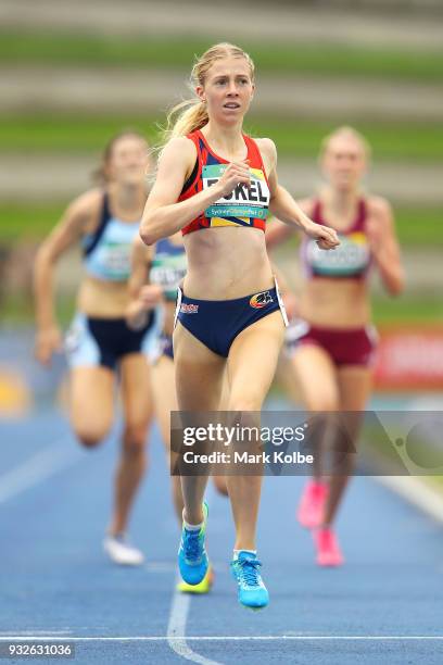 Sarah Eckel of South Australia wins the women's under 20 1500 Metre final during day three of the Australian Junior Athletics Championships at Sydney...