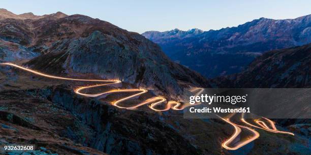 switzerland, valais, alps, gotthard pass in the evening - valais canton stock pictures, royalty-free photos & images