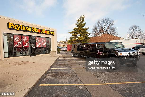 Limo leaving the store lot with happy Children with new shoes at Payless ShoeSource on November 20, 2009 in Cincinnati, Ohio.