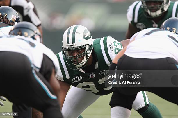 Defensive End Marques Douglas of the New York Jets battles at the line when the New York Jets host the Jacksonville Jaguars at Giants Stadium on...