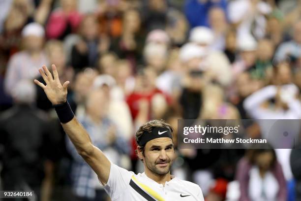 Roger Federer of Switzerland celebrates his win over Hyeon Chung of Korea during of the BNP Paribas Open at the Indian Wells Tennis Garden on March...