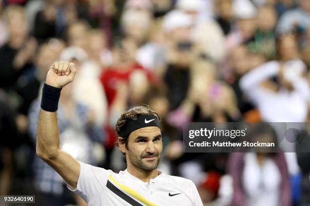 Roger Federer of Switzerland celebrates his win over Hyeon Chung of Korea during of the BNP Paribas Open at the Indian Wells Tennis Garden on March...