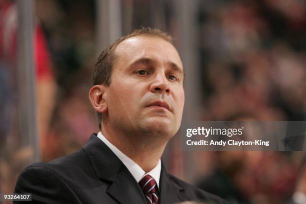 Minnesota Wild head coach Todd Richards watches the action from the bench against the Anaheim Ducks during the game at the Xcel Energy Center on...