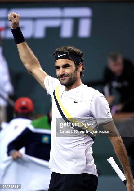 Roger Federer Switzerland celebrates after defeating Hyeon Chung of Korea during Day 11 of BNP Paribas Open on March 15, 2018 in Indian Wells,...