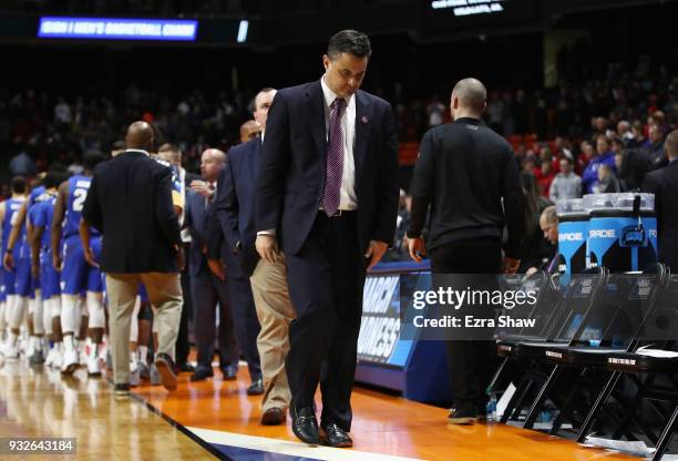 Head coach Sean Miller of the Arizona Wildcats leaves the court after being defeated by the Buffalo Bulls 89-68 during the first round of the 2018...