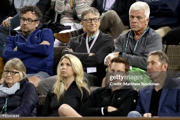 Bill Gates watches Roger Federer of Switzerland play Hyeon Chung of Korea during of the BNP Paribas Open at the Indian Wells Tennis Garden on March...