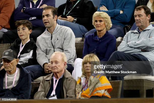Pete Sampras, Gill Brook and Wimbledon Chairman Phillip Brook watch Roger Federer of Switzerland play Hyeon Chung of Korea during of the BNP Paribas...