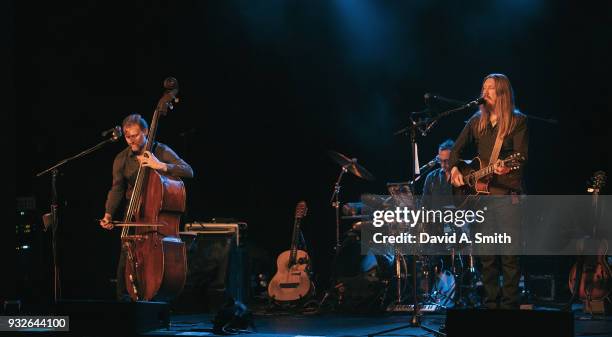 Chris Wood, Jano Rix, and Oliver Wood of The Wood Brothers perform at Iron City on March 15, 2018 in Birmingham, Alabama.