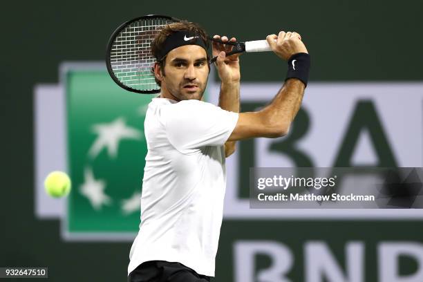 Roger Federer of Switzerland returns a shot to Hyeon Chung of Korea during of the BNP Paribas Open at the Indian Wells Tennis Garden on March 15,...