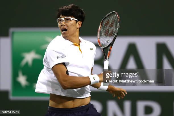 Hyeon Chung of Korea returns a shot to Roger Federer of Switzerland during of the BNP Paribas Open at the Indian Wells Tennis Garden on March 15,...
