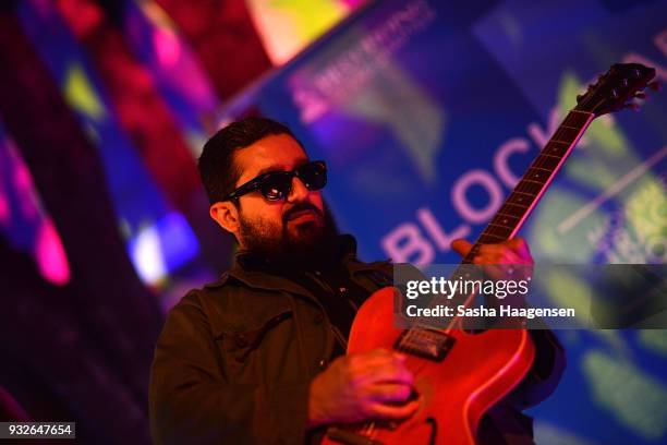 Grupo Fantasma guitarist Beto Martinez performs at the Recording Academy Block Party at Four Seasons Hotel during SXSW on March 15, 2018 in Austin,...