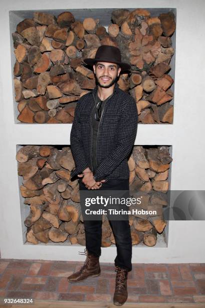 Mena Massoud attends the grand opening of FARMHOUSE Los Angeles on March 15, 2018 in Los Angeles, California.