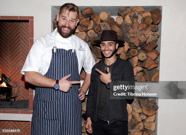 Nathan Peitso and Mena Massoud attend the grand opening of FARMHOUSE Los Angeles on March 15, 2018 in Los Angeles, California.