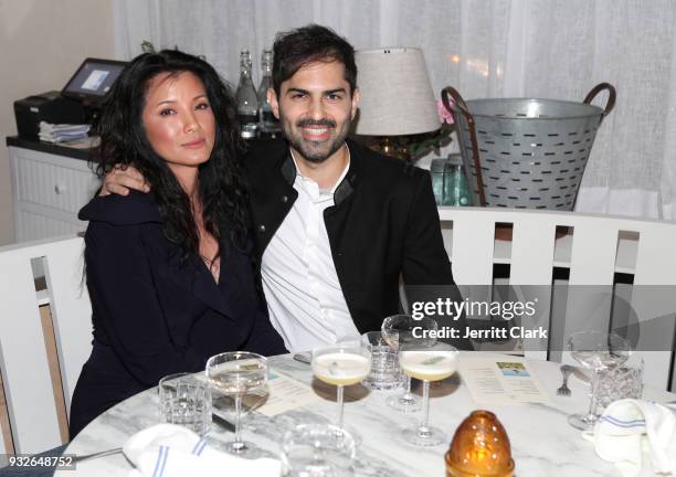 Kelly Hu and guest attend the grand opening of FARMHOUSE Los Angeles on March 15, 2018 in Los Angeles, California.