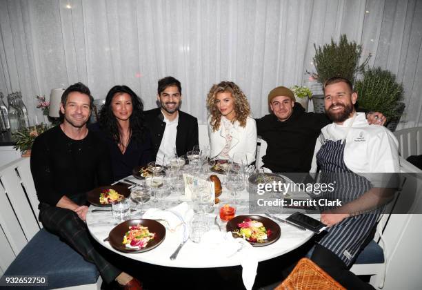 Ian Bohen, Kelly Hu, Guest, AnnaLynne McCord, Casper Smart and Nathan Peitso attend the grand opening of FARMHOUSE Los Angeles on March 15, 2018 in...