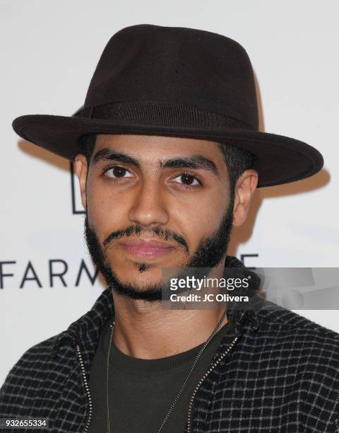 Mena Massoud attends the grand opening of Farmhouse Los Angeles at Farmhouse on March 15, 2018 in Los Angeles, California.