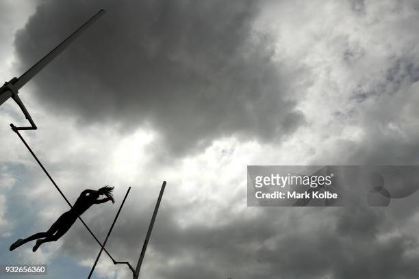 Competitor clears the bar as she competes in the Women's under 20 Pole Vault during day three of the Australian Junior Athletics Championships at...