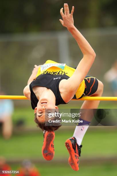 Michael Christie of Western Australia competes in the Men';s under 17s high jump during day three of the Australian Junior Athletics Championships at...