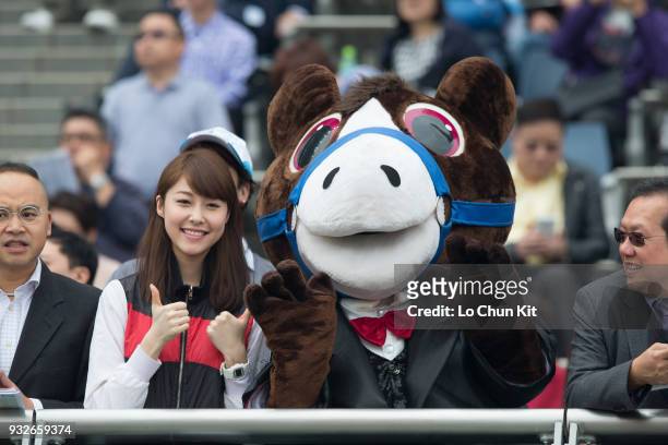 The Racing Club cheering team supporting their horse Young Ranger during the Race 3 Helene Mascot Handicap at Sha Tin racecourse on March 15, 2015 in...