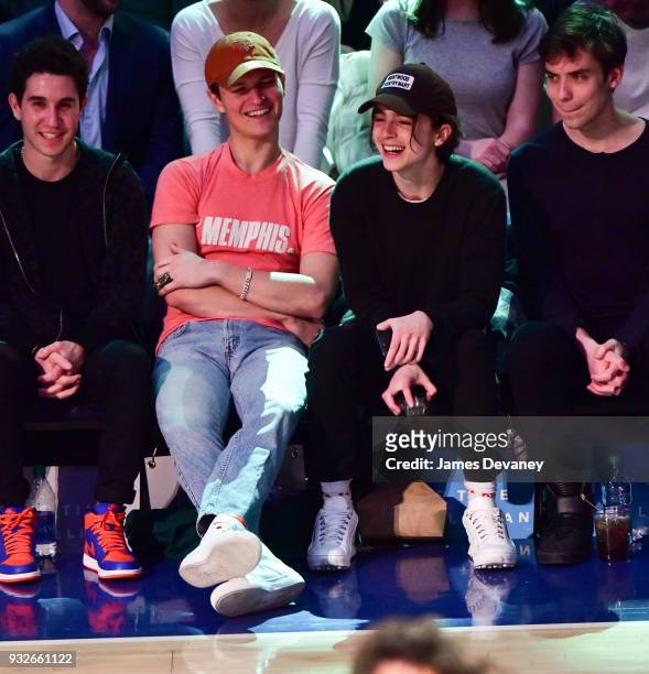 Ansel Elgort and Timothee Chalamet attend New York Knicks Vs Philadelphia 76ers game at Madison Square Garden on March 15, 2018 in New York City.
