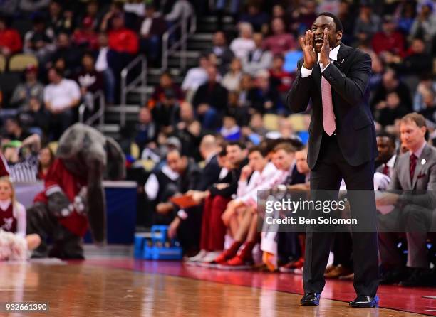 Head coach Avery Johnson of the Alabama Crimson Tide yells to his players in the first half during the game against the Virginia Tech Hokies in the...