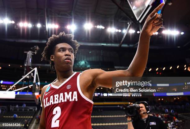 Collin Sexton of the Alabama Crimson Tide points to the crowd as he walks off the court following the Alabama Crimson Tide 86-83 win over the...