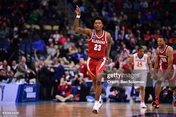 John Petty of the Alabama Crimson Tide reacts after a basket in the second half during the game against the Virginia Tech Hokies in the first round...