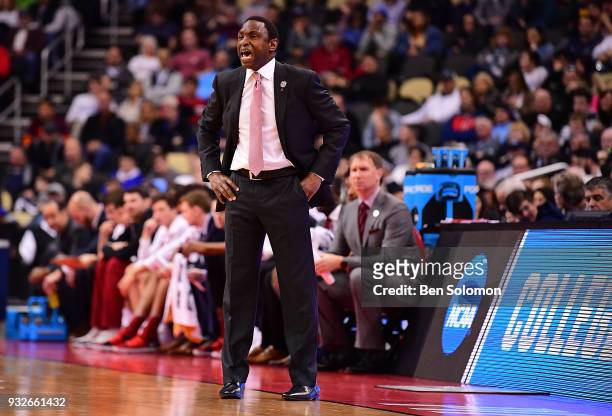 Head coach Avery Johnson of the Alabama Crimson Tide yells to his players in the first half during the game against the Virginia Tech Hokies in the...