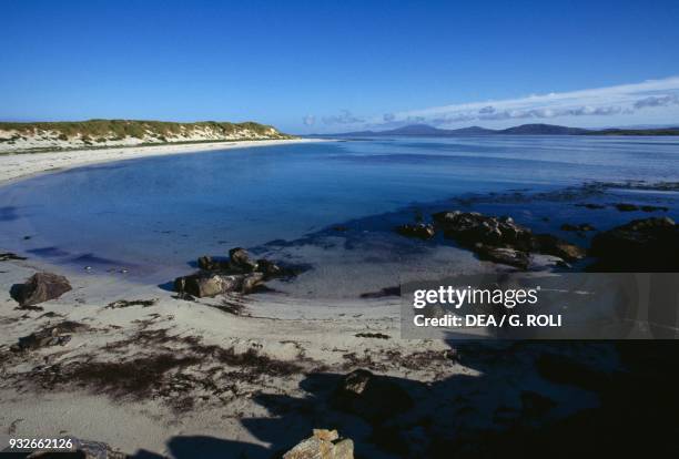 Beach in a bay on Barra island, Outer Hebrides, Scotland, United Kingdom.