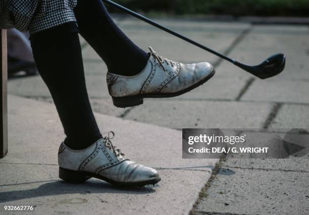 Golfer, detail of the shoes, Royal and Ancient Golf Club of St Andrews, St Andrews, Scotland, United Kingdom.