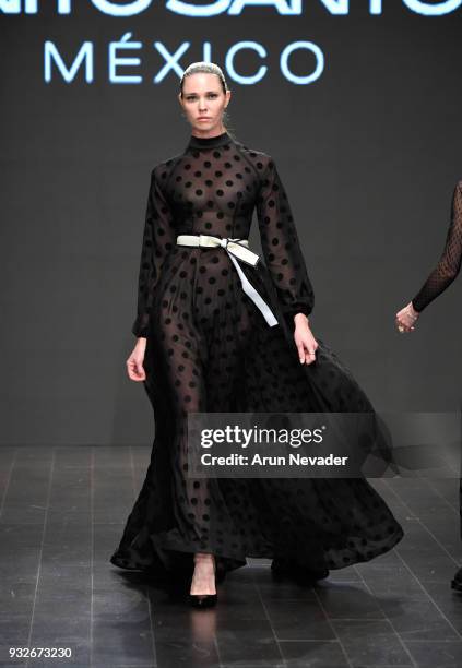 Model walks the runway wearing Benito Santos at Los Angeles Fashion Week Powered by Art Hearts Fashion LAFW FW/18 10th Season Anniversary at The...