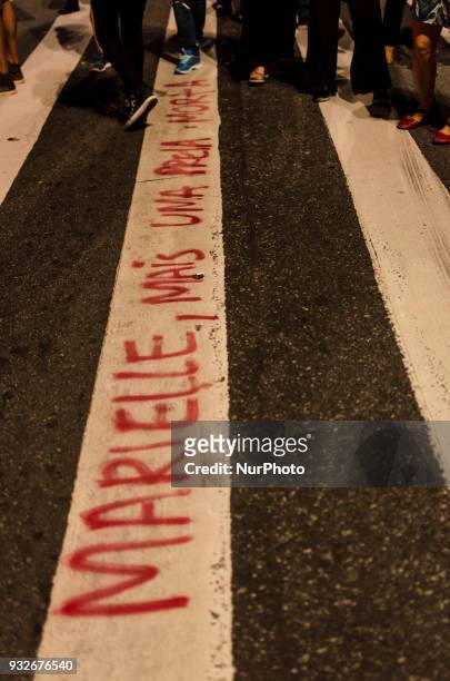 Thousands of people gather in Paulista Avenue, downtown Sao Paulo, in a demonstration in memory of Marielle Franco, killed this wednesday in Rio de...