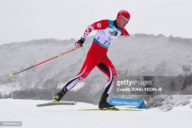 Mark Arendz of Canada competes in the men's 15km standing biathlon event at the Alpensia Biathlon Centre during the Pyeongchang 2018 Winter...