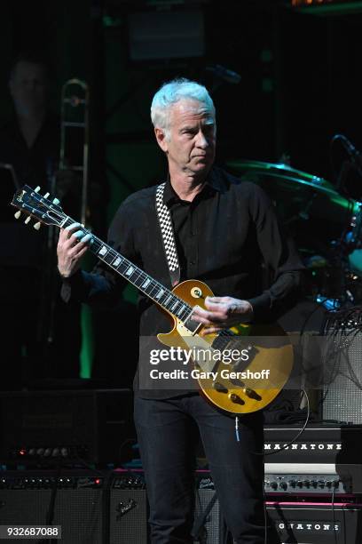 John McEnroe performs during the 2nd Annual Love Rocks NYC concert benefitting God's Love We Deliver at the Beacon Theatre on March 15, 2018 in New...