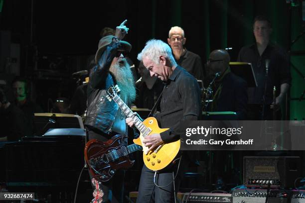 Guitarists Billy Gibbons and John McEnroe perform during the 2nd Annual Love Rocks NYC concert benefitting God's Love We Deliver at the Beacon...