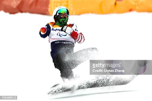 Mike Minor of the United States reacts after competes in the Men's Banked Slalom SB-UL Run 3 during day seven of the PyeongChang 2018 Paralympic...