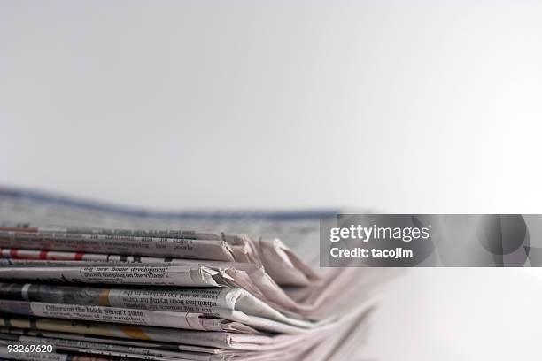 newspaper stack - tribune tower stock pictures, royalty-free photos & images