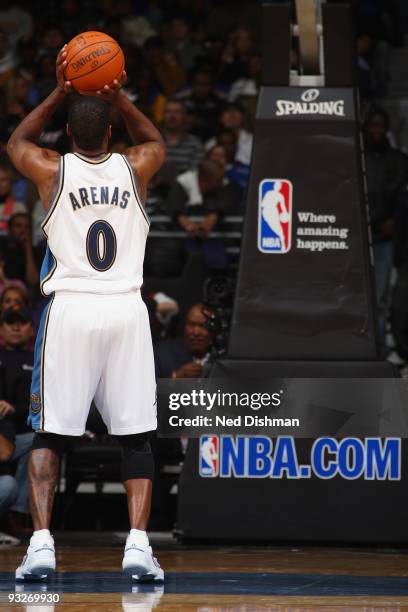 Gilbert Arenas of the Washington Wizards shoots a free throw during the game against the Miami Heat at the Verizon Center on November 4, 2009 in...