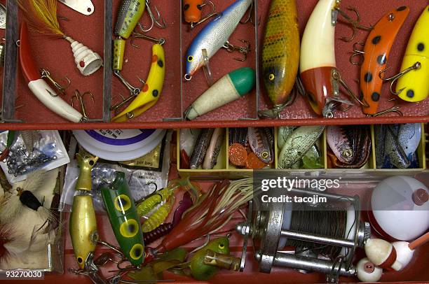 tackle box filled with lures and hooks - fishing tackle box stock pictures, royalty-free photos & images