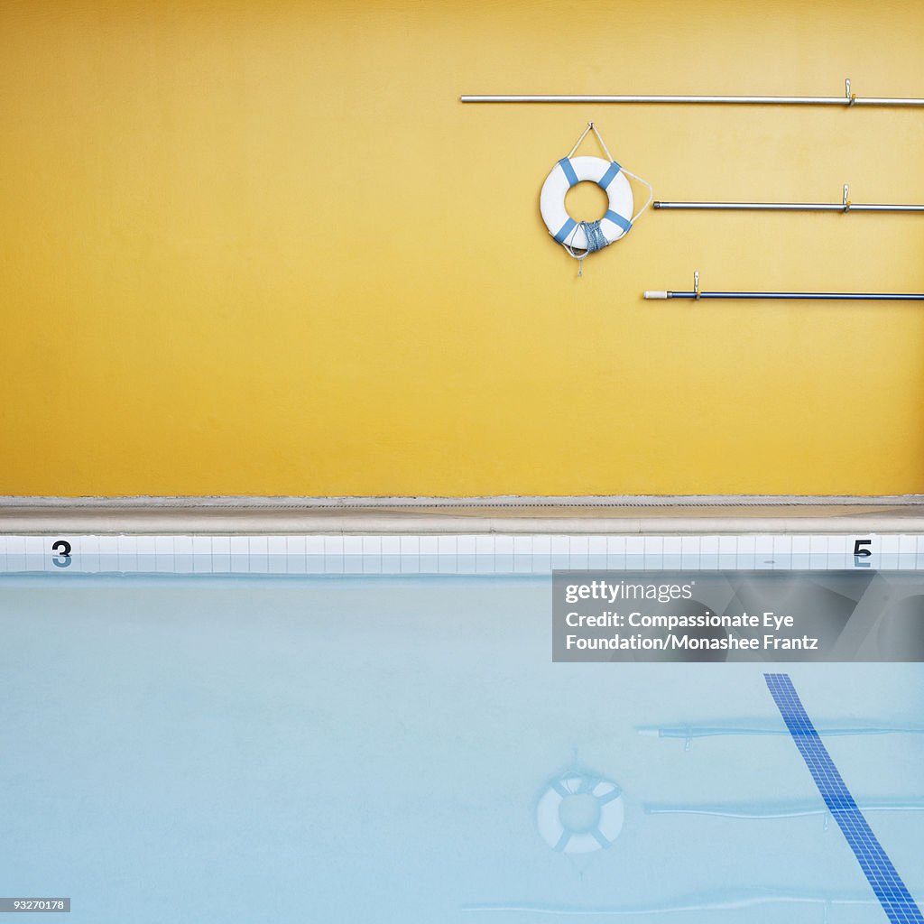 Empty Swimming Pool Floatation Device On Wall High-Res Stock Photo ...