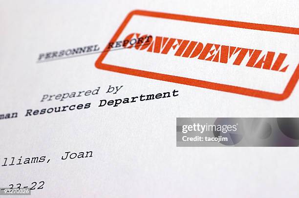 a document stamped with the word confidential - privacy stock pictures, royalty-free photos & images