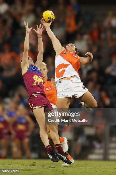 Courtney Gum of the Giants and Nat Exon of the Lions compete for a mark during the round seven AFLW match between the Greater Western Sydney Giants...